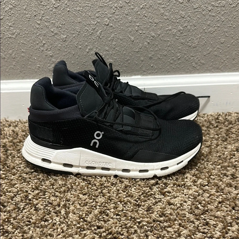 On Running Black Athletic Shoes with White Soles - Picture 2 of 3